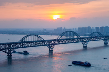 jiujiang yangtze river bridge closeup in sunset
