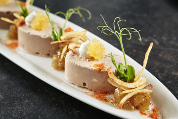 Exquisite Serving White Restaurant Plate with Mousse of Cod Liver, Onion and Crispy Chips