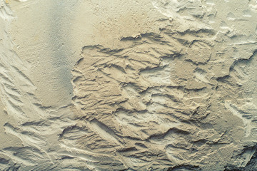 Renovation at home. Plasterer spreading plaster on wall. Who plaster wall plaster master.