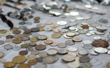 Background of vintage israeli and foreign coins for sale at Old Jaffa Flea Market