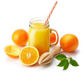 Fresh orange juice with fruit and green leaves in glass can straw wooden juicer stick, isolated on white background clipping path included.