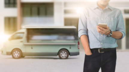  Business man using smartphone in hand