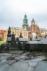 Naklejka na ściany i meble Model of Wawel complex with real buildings in background
