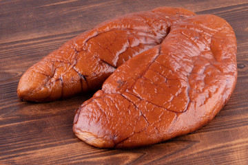 raw smoked cod caviar on wooden background