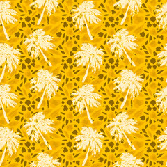 seamless African pattern on a yellow spotted background, imitation of animal skins, tropical palms, camouflage safari print. for fabric, clothes, swimsuits.