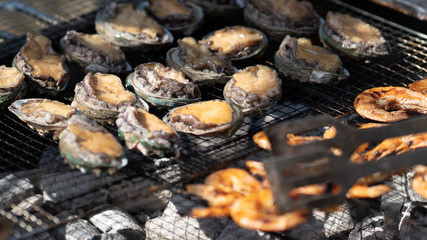 Seafoods that are grilled over charcoal on holidays.