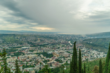 Obraz premium Panoramic view of Tbilisi from Mount Mtatsminda on a cloudy day, Georgia