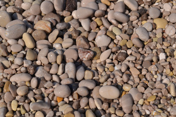 Abstract background with pebbles - round sea stones