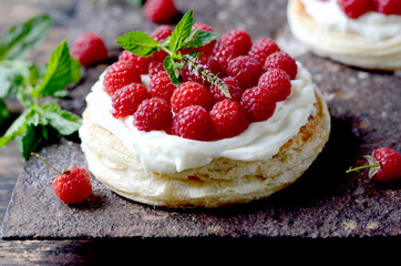 Tart with cheese cream and raspberries