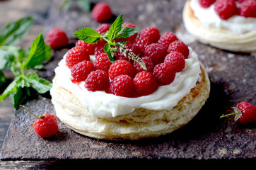 Tart with cheese cream and raspberries