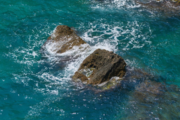 Rock and sea waves background