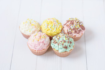 cute candles in the form of cakes pastel colors 