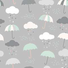 Cute vector pattern with umbrellas, clouds and rain drops. Scandinavian style seamless background.