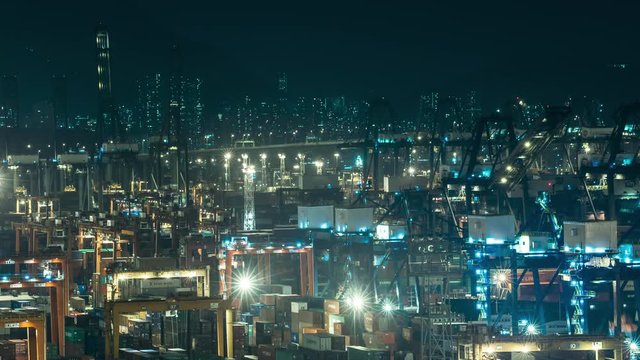 Shipping containers on dock container terminal Panorama of Hong Kong shipyard at night timelapse logistics concept
