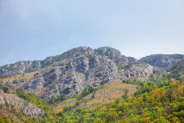 Fototapeta na wymiar landscape with stone bridge high in the mountain