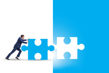 Concept of businessman with missing jigsaw puzzle piece