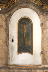 Fototapeta na wymiar Crucifixion, door of the Tabernacle on the main altar in the Church of Saint Mary Magdalene in Cazma, Croatia