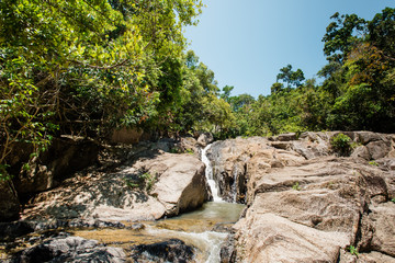 A small waterfall in the rainforest on the island of Phangan Thailand