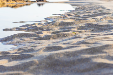 sandy shore on the beach at sunrise, galicia