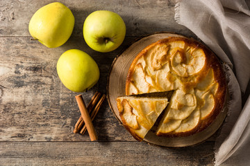 Homemade apple pie on wooden table. Top view. Copy space