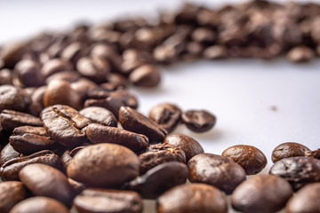 Coffee Beans Background. Close Up fresh roasted brown