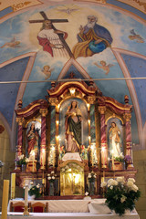 Fototapeta na wymiar Main altar in the Church of Saint Barbara in Rude, Croatia