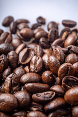 Coffee Beans Background. Close Up fresh roasted brown