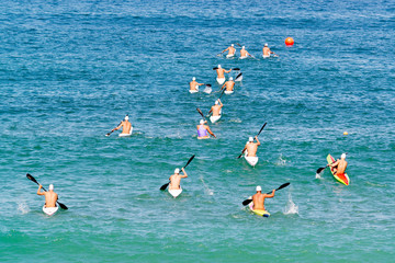 kayak race course with athletes in sea ,  lifeguard lifesafer championships