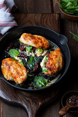 Baked Chicken fillet stuffed with cheese and spinach