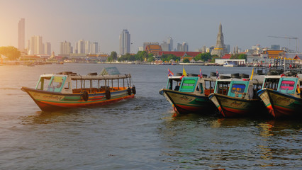 Fototapeta premium Colorful Passenger Boats at Chao Phraya River, bangkok thailand.