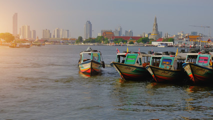 Fototapeta premium Colorful Passenger Boats at Chao Phraya River, bangkok thailand.