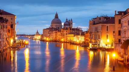 Obraz na płótnie Canvas Grand Canal at night, Venice. Santa Maria della Salute church at night city lights, Italy. Venice cityscape illuminated by city lights