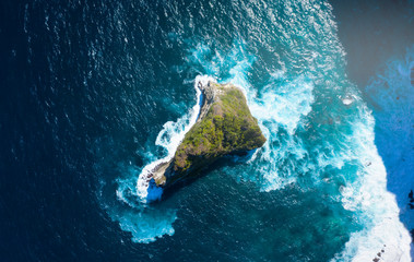 Top View of Nusa Banah Island at Nusa Penida, Bali - Indonesia. Small Triangle Shape Island © natanaelginting