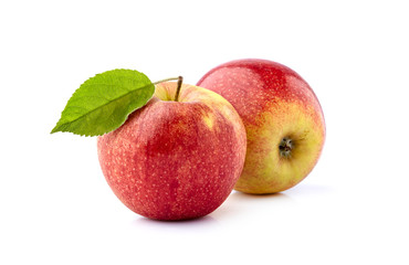 Red apples with leaf  on white background