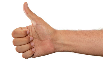 Hand with fingers set into thumbs up gesture. Isolated on a white background. Symbolizing positive reaction to something.