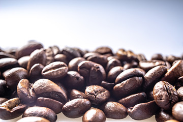Coffee Beans Background. Close Up fresh roasted brown