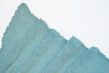 Woolen scarf on white background, close up