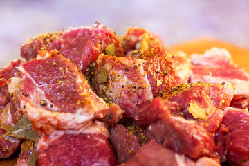 Meat, chopped in large pieces, with spices_
