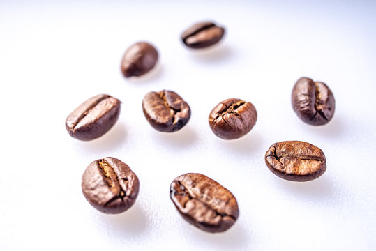 Coffee Beans Background. Close Up fresh roasted brown © Liran