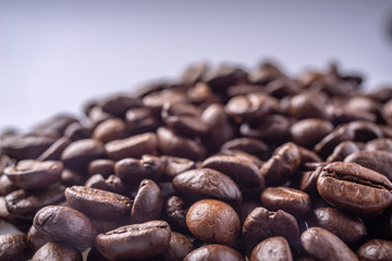 Coffee Beans Background. Close Up fresh roasted brown