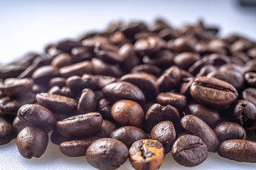 Coffee Beans Background. Close Up fresh roasted brown