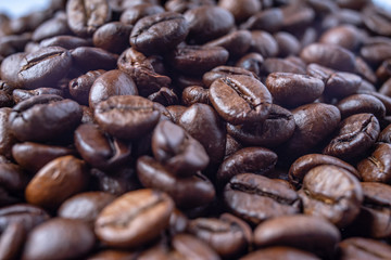 Coffee Beans Background. Close Up fresh roasted brown