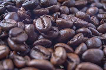 Coffee Beans Background. Close Up fresh roasted brown