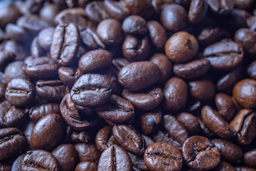 Coffee Beans Background. Close Up fresh roasted brown