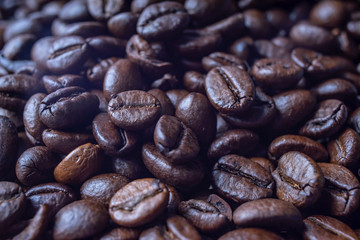 Coffee Beans Background. Close Up fresh roasted brown