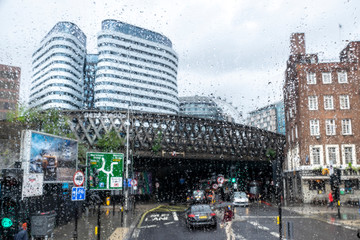 Fototapeta na wymiar London through a wet glass