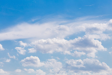 White clouds with blue sky background.