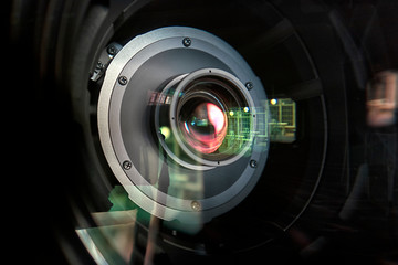Fototapeta na wymiar close up of a television lens on a dark background