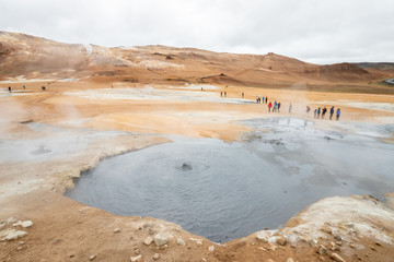 Hverir Namafjall colorful geothermal place in Iceland. Fumaroles volcanic boiling mud pots,...