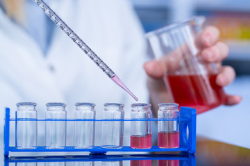 Using  pipette in the laboratory